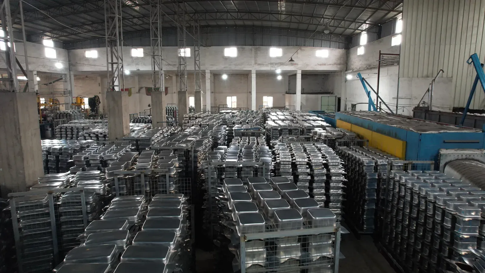 Food pans arranged on racks inside the SEEKTAY factory